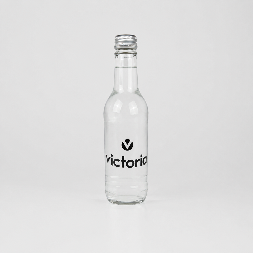 Botella de agua de cristal personalizada con tapón de rosca y etiqueta adhesiva
