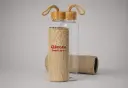 Glass bottle with protection sleeve and bamboo cap NATURE 55.