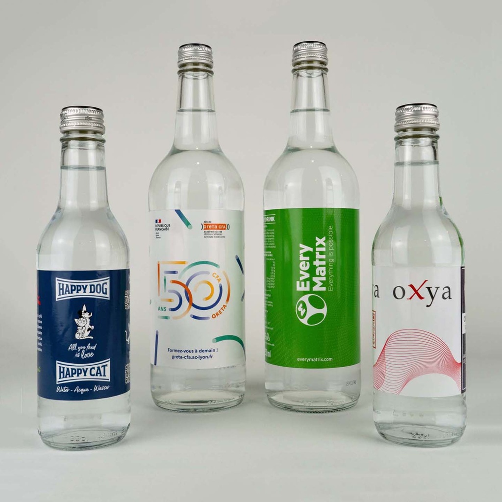 Personalized glass water bottle with screw cap and adhesive label